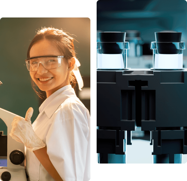 Scientist smiling beside a laboratory microscope.