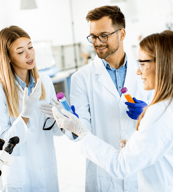 Scientists discussing test results in a lab.